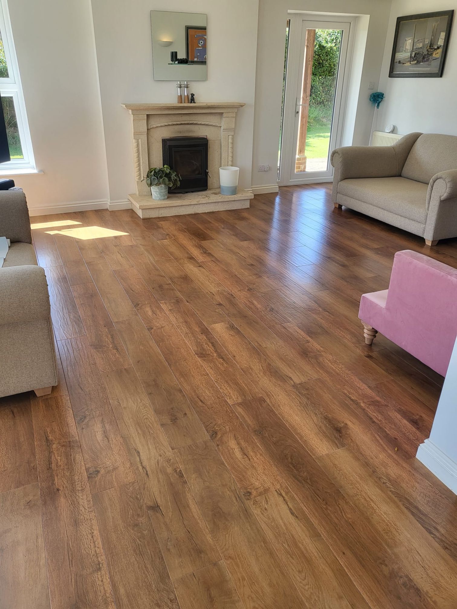 A beautiful lounge with Karndean Art Select Summer Oak flooring